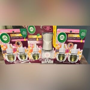 Air Wick Plug In Air Fresher Unit + 5 Essential Oil Refills White Flower & Melon